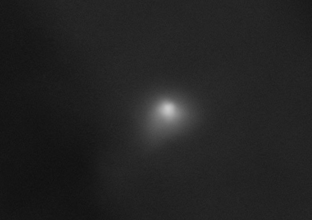 <p>The High Resolution Imaging Science Experiment (HiRISE) camera aboard NASA's Mars Reconnaissance Orbiter captured this image of interstellar comet 3l/ATLAS on Oct. 2, 2025. At the time it was imaged, the comet was about 0.2 astronomical units (19 million miles, or 30 million kilometers) from the spacecraft</p>