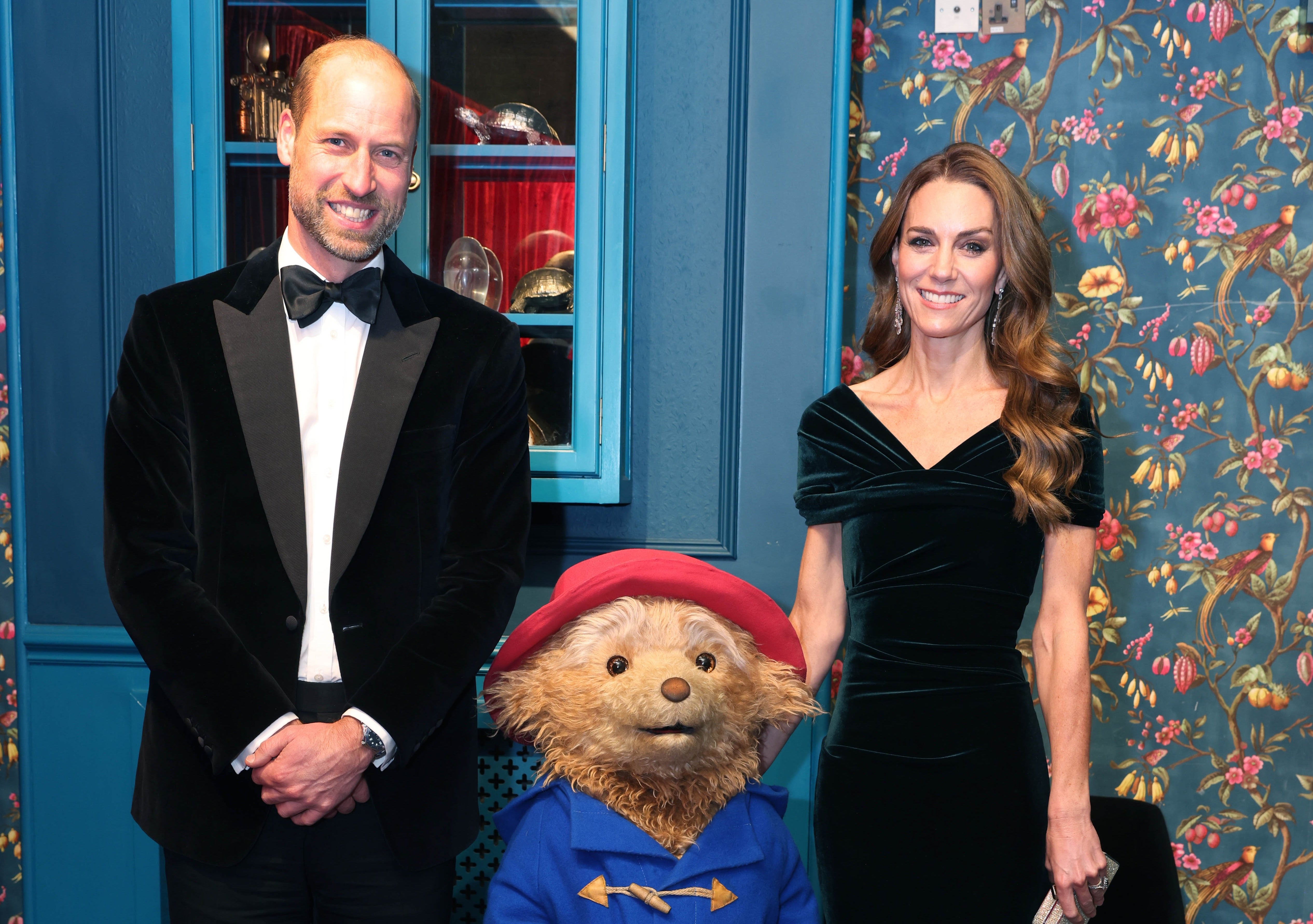 <p>Kate and William pose with Paddington Bear</p>