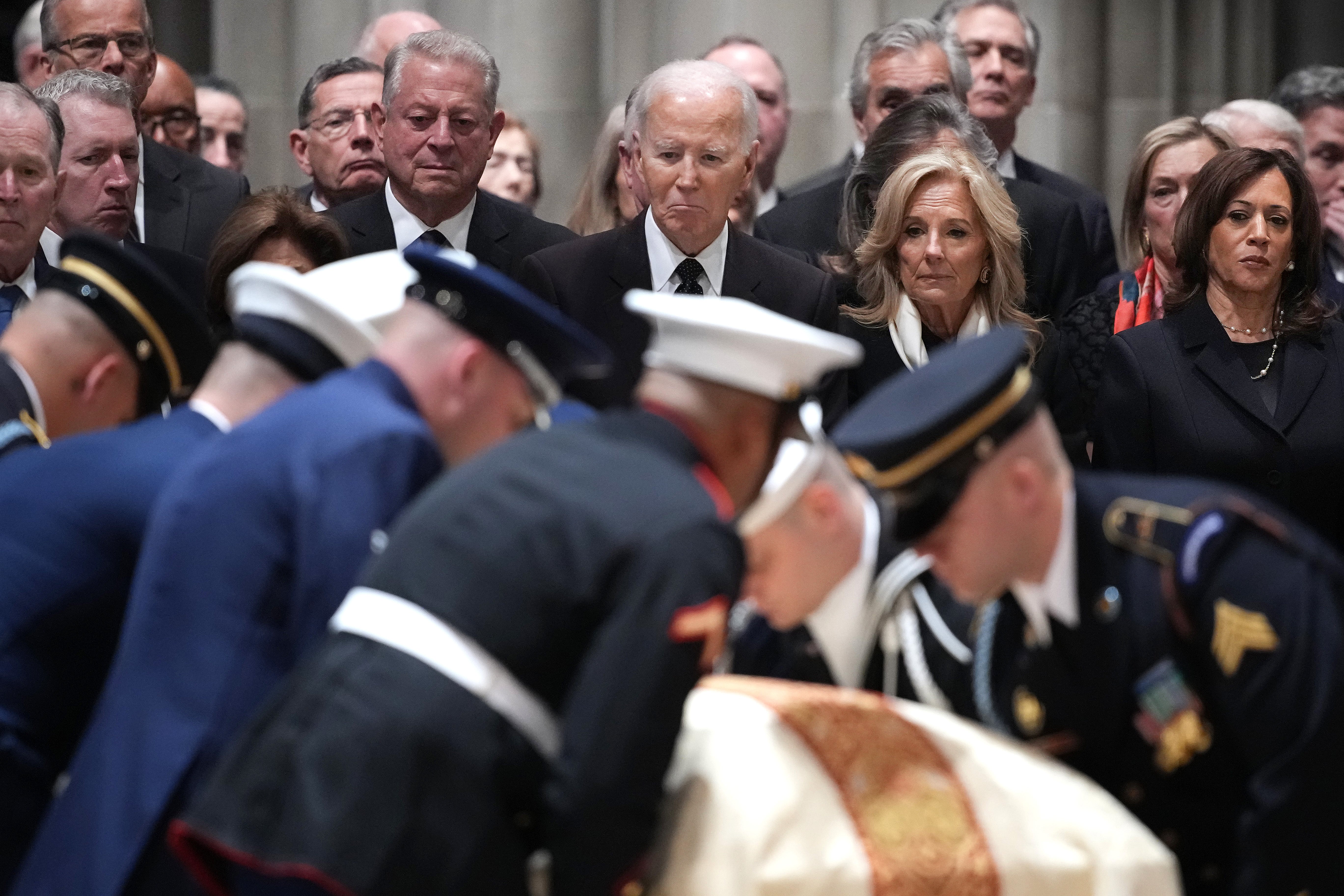 <p>Former U.S. Vice President Al Gore, former President Joe Biden, former first lady Jill Biden, and former Vice President Kamala Harris stand as U.S. military body bearers carry the casket containing the remains of former U.S. Vice President Dick Cheney during Cheney's funeral service at the National Cathedral on November 20, 2025 in Washington, DC</p>