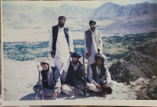 <p>Maiwand Banayee, sitting on the far right, with fellow Taliban fighters in Maidan-Shar, Afghanistan</p>
