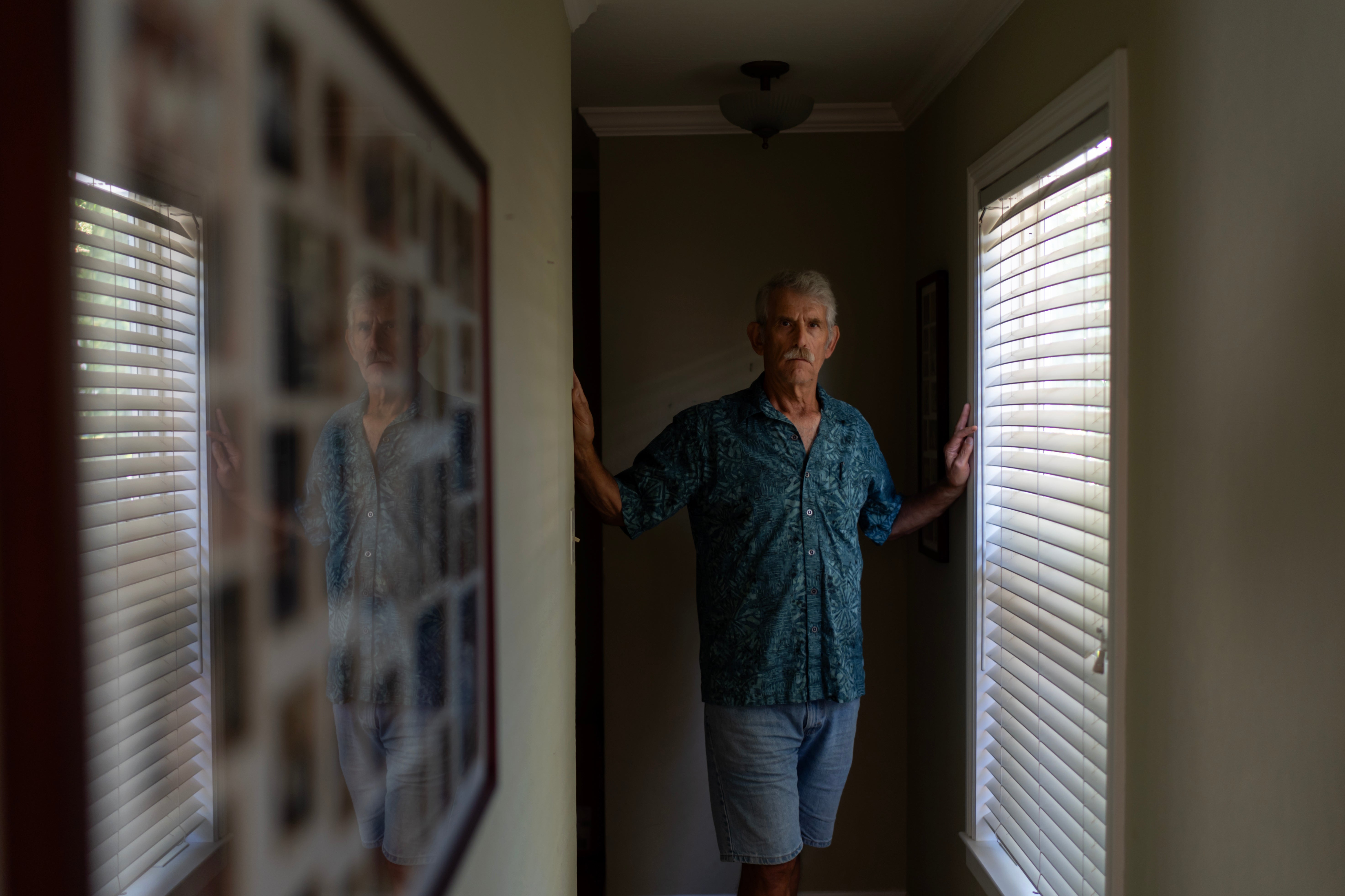 Christy Morrill, 72, who lost decades of memories to autoimmune encephalitis, poses for a photo at his home, Wednesday, Aug. 20, 2025, in San Carlos, Calif