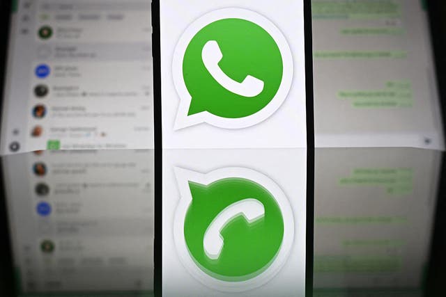 <p>The WhatsApp logo pictured in front of a laptop screen in Guildford, UK, on 17 April, 2025</p>