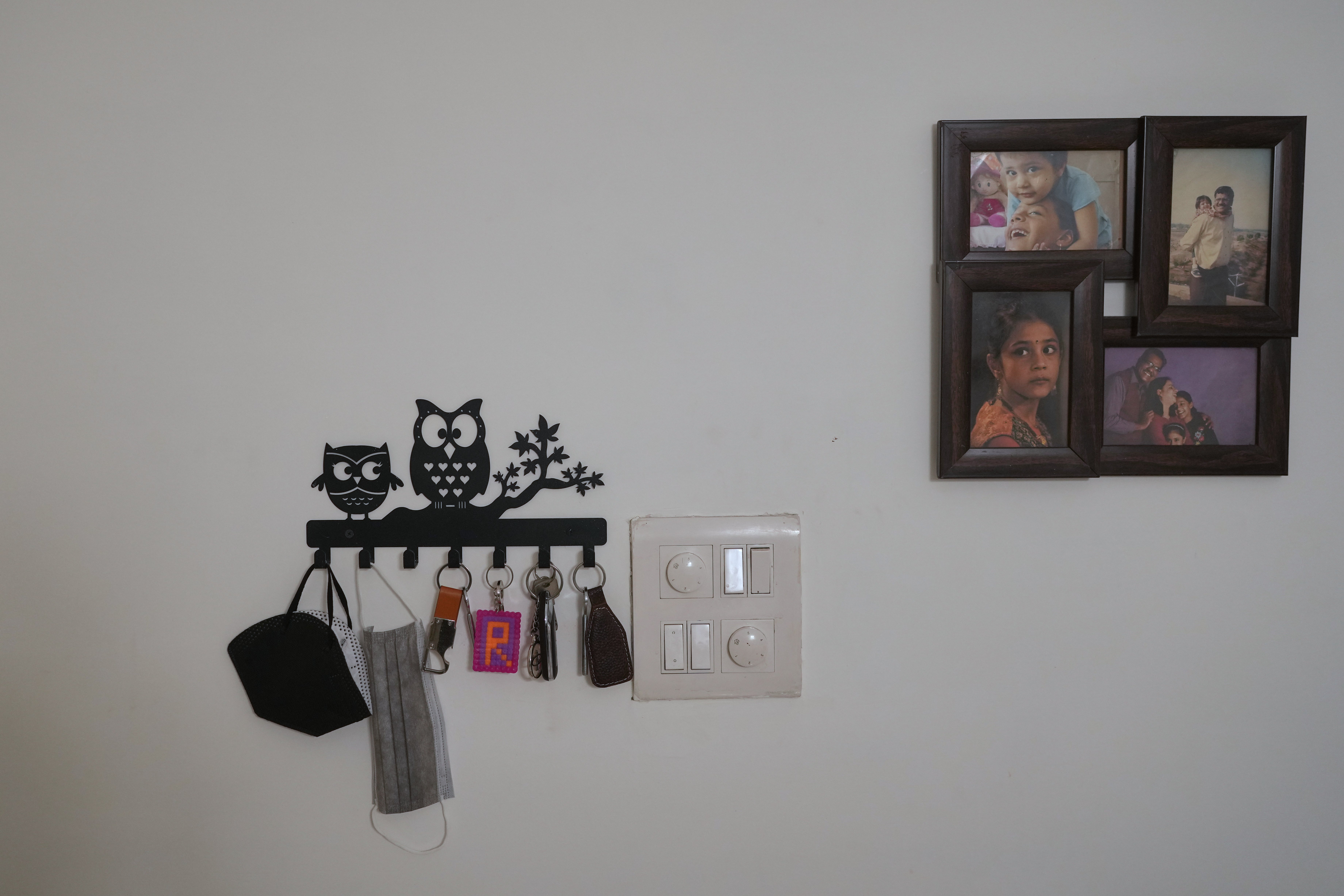Face masks hang inside a house in New Delhi, India, Tuesday, Nov. 18, 2025. (AP Photo/Manish Swarup)
