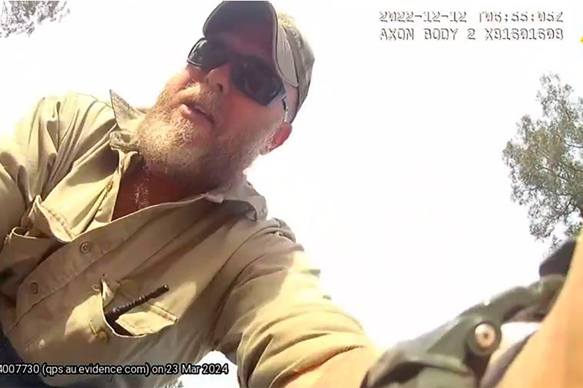 Coroner says Australian extremists who killed police officers had shared delusional disorder