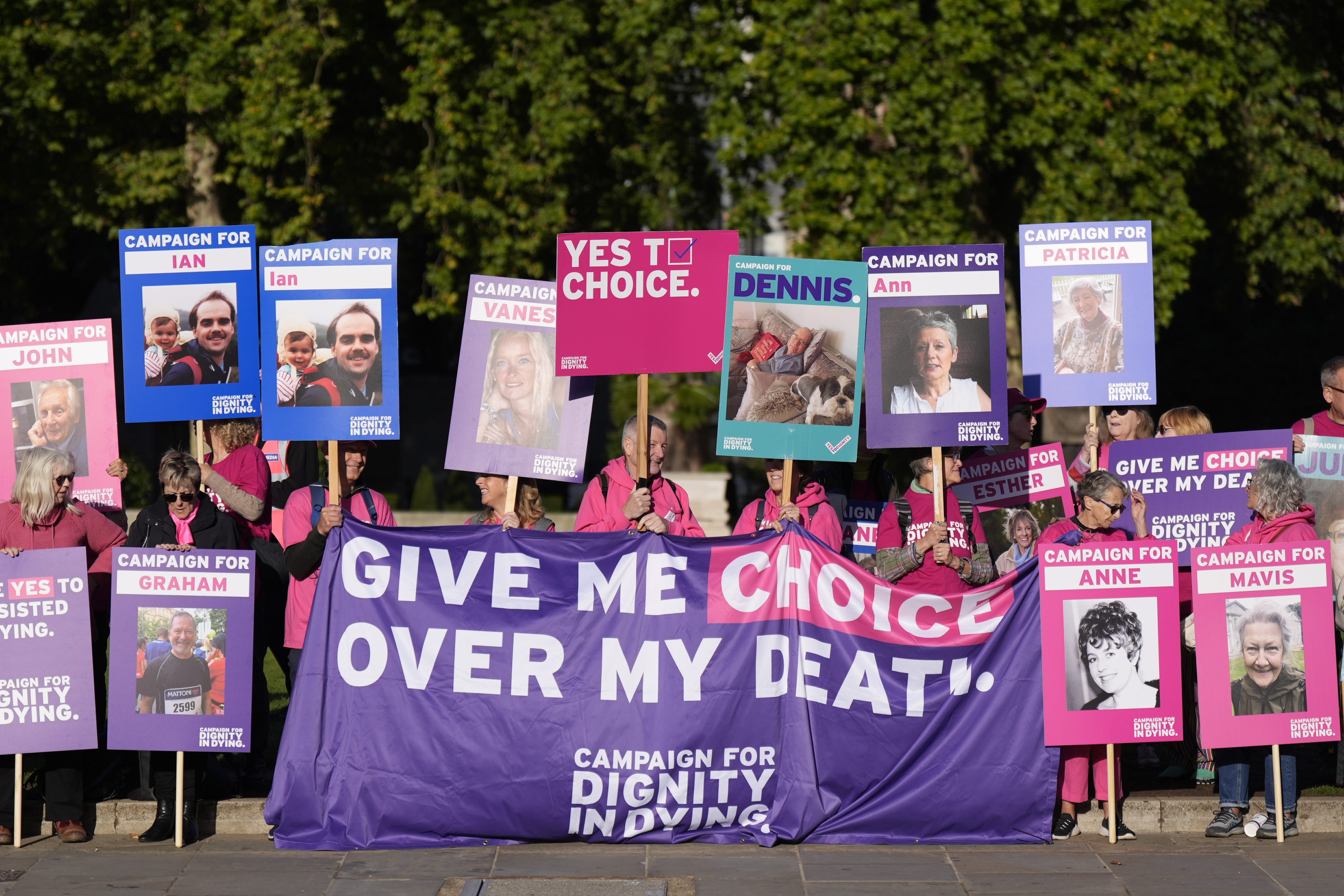 Pro-assisted dying campaigners outside the Houses of Parliament (Aaron Chown/PA)