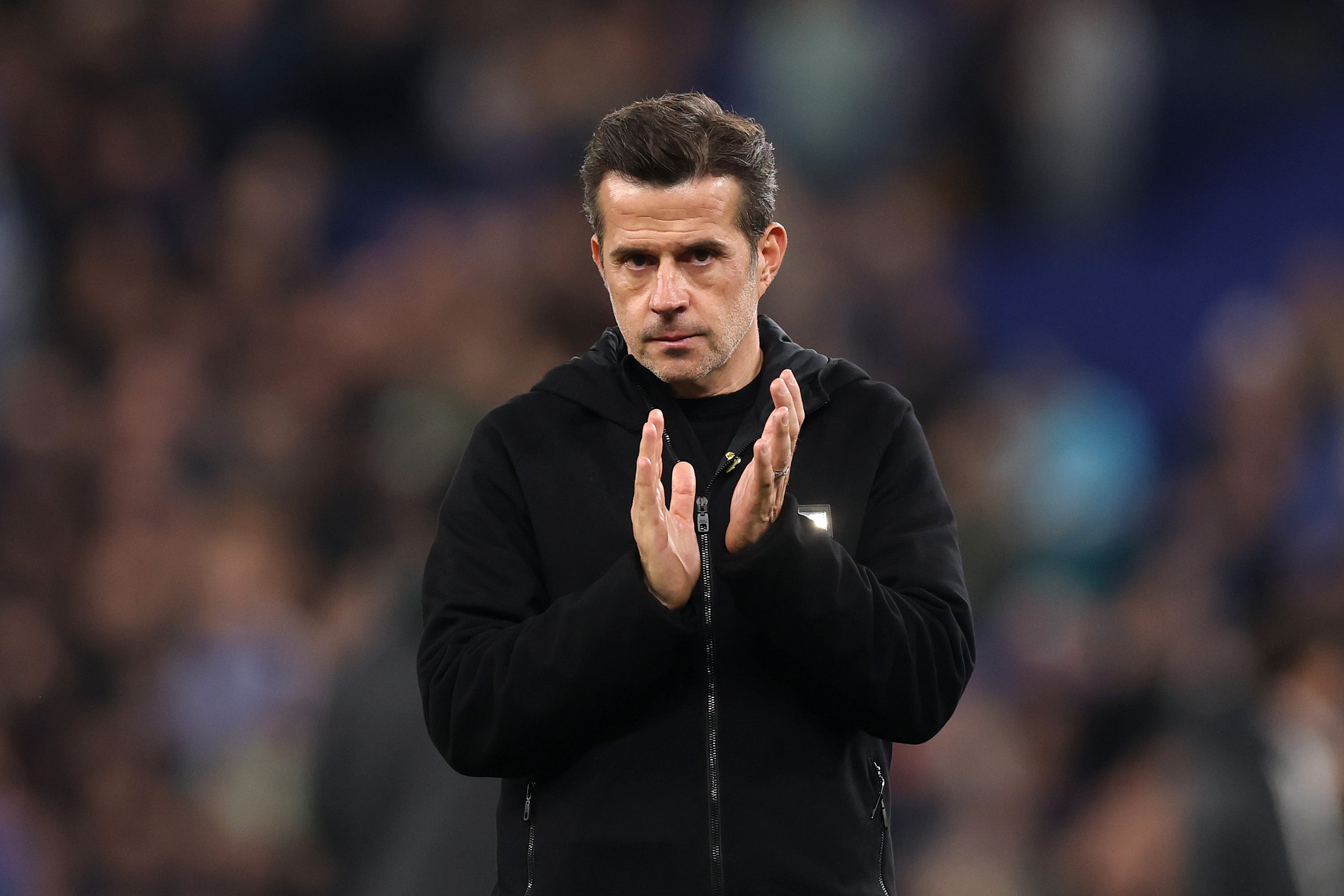 <p>Marco Silva, Manager of Fulham, acknowledges the fans after the teams defeat in the Premier League match between Everton and Fulham</p>