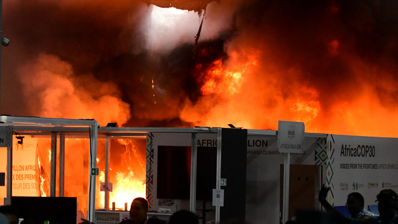 The symbolism was hard to escape when part of the conference site burst into flames on thursday