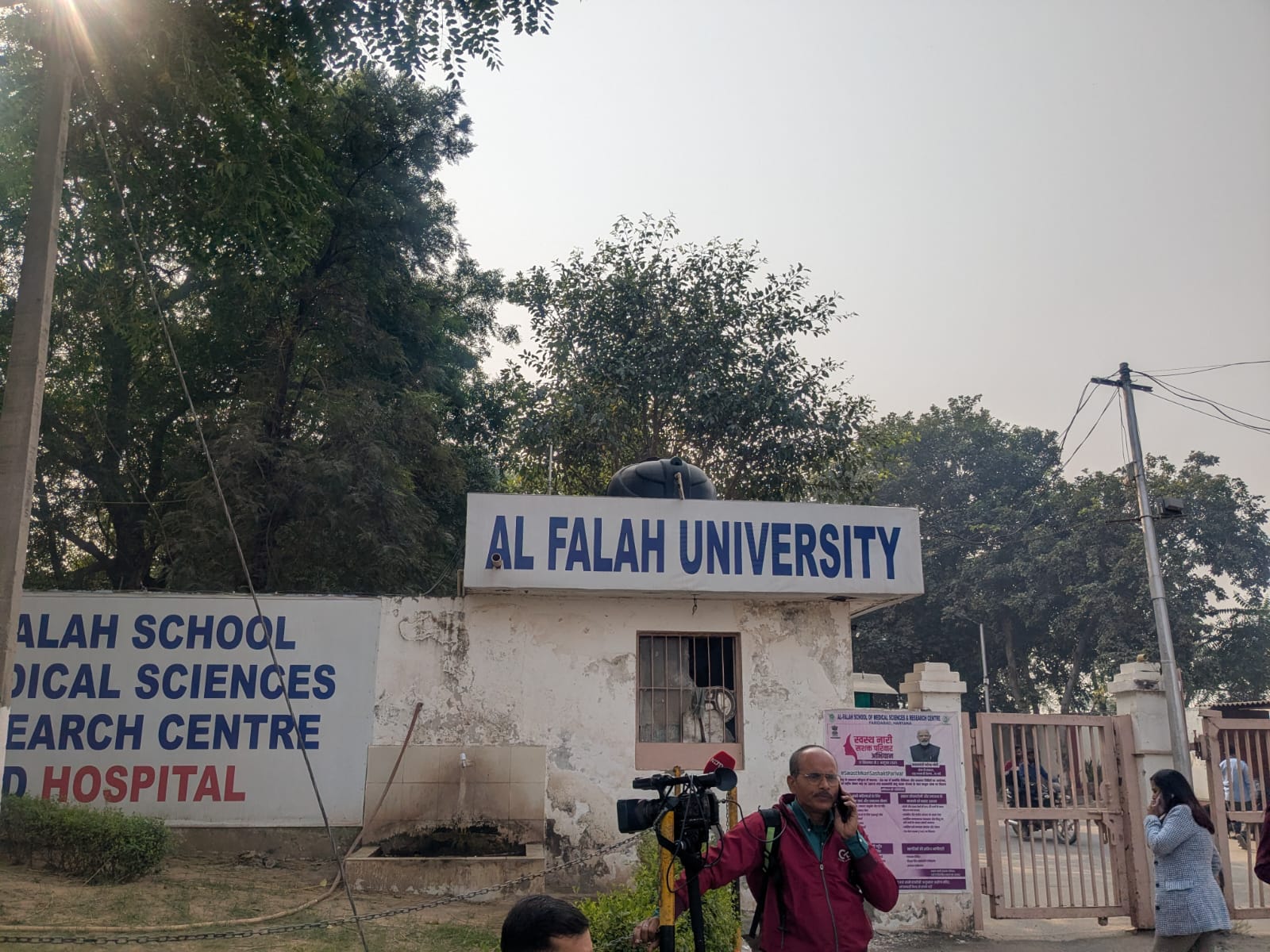 Media crew outside Faridabad's Al Falah University, where authorities are probing links to the deadly blast in New Delhi
