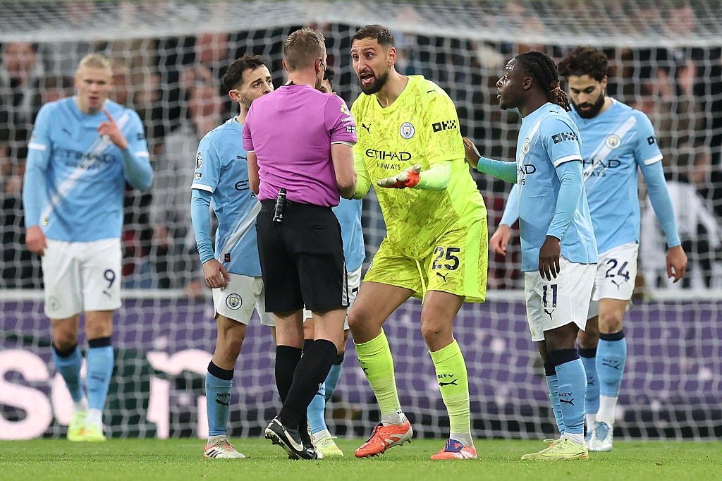 City players surrounded referee Sam Barrot after Barnes scored the second