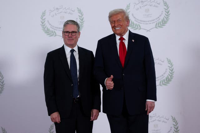US President Donald Trump and Prime Minister Sir Keir Starmer pose for a photo at the Sharm El Sheikh Peace Summit in Egypt (Suzanne Plunkett/PA)