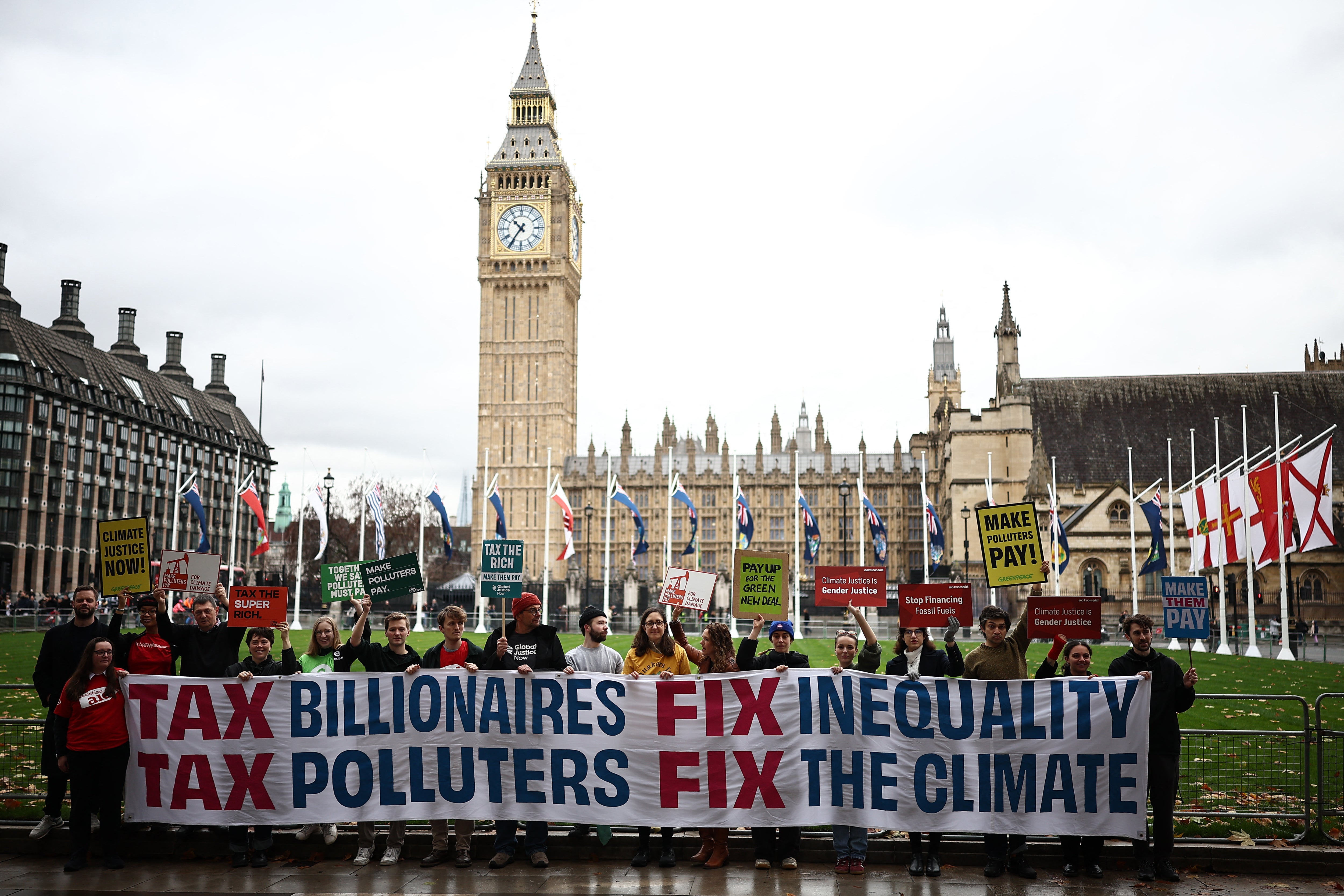 Activists from the 'Make Them Pay' and 'Make Polluters Pay' coalitions have called for higher taxes on billionaires