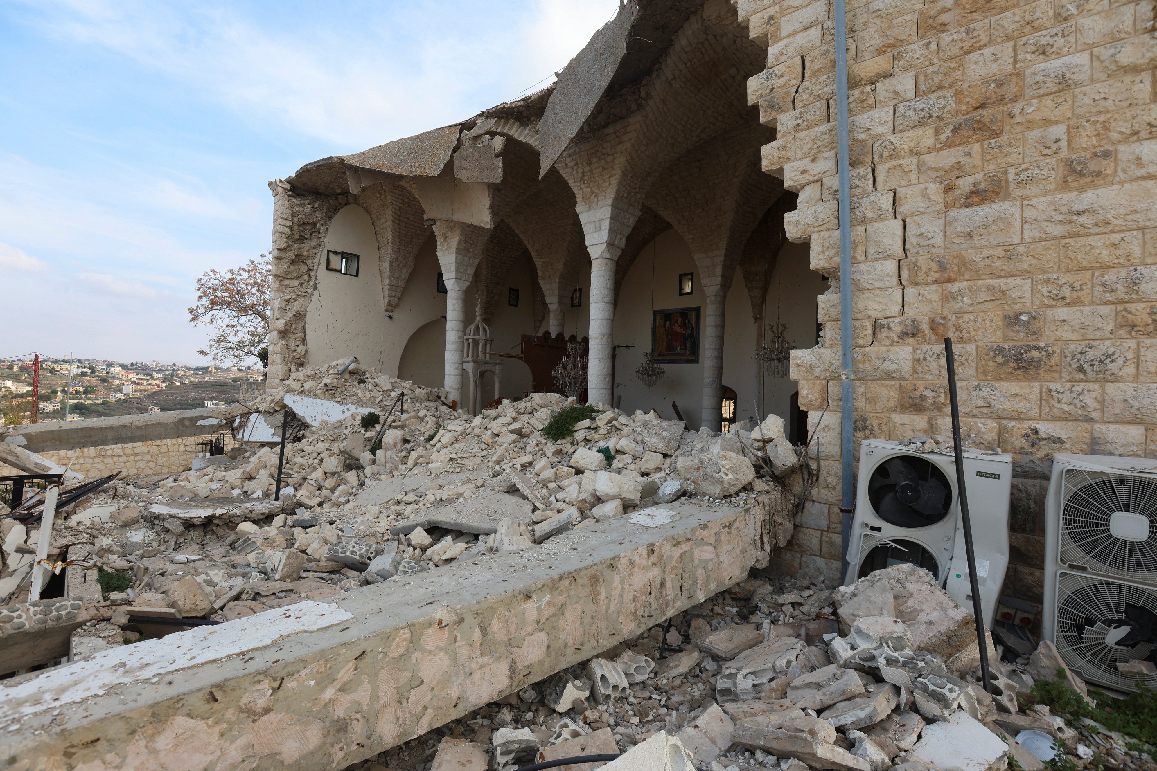 Piles of rubble at the St. George Melkite Catholic Church, damaged in October 2024, during hostilities between Israel and Hezbollah, in town of Dardaghiya