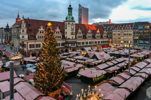 <p>The Christmas tree at Leipzig's Christmas market is illuminated during a lighting rehearsal, in Leipzig, Germany.</p>