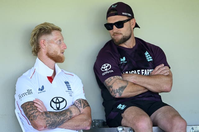 <p>Ben Stokes in conversation with England head coach Brendon McCullum</p>