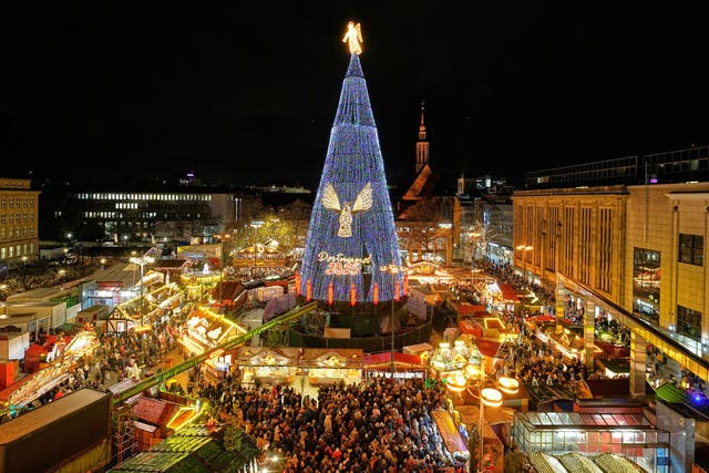 <p>The traditional 45m Dortmund Christmas tree, made of 1,200 red spruces, at the Christmas market in Dortmund, Germany</p>