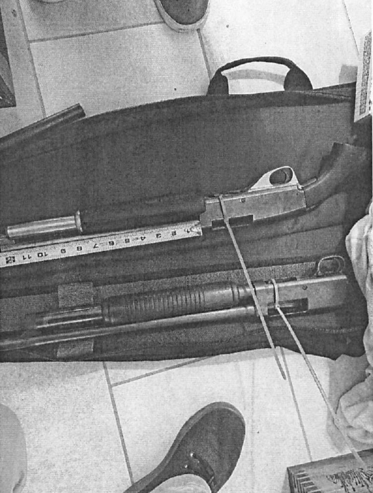 A sawed-off shotgun the FBI says agents found in Temple's bedroom