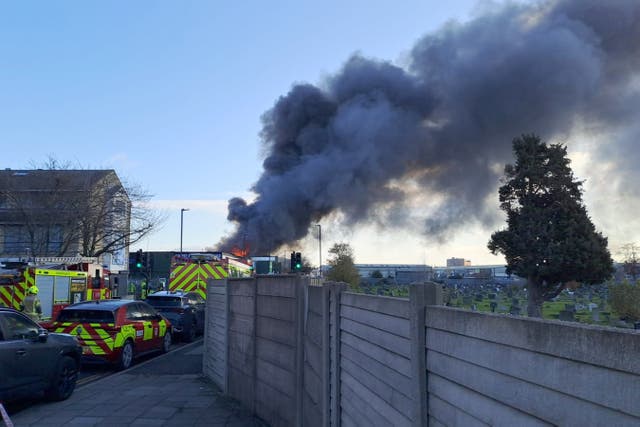 <p>Firefighters battle the blaze at a warehouse on Bridge Road, Southall</p>