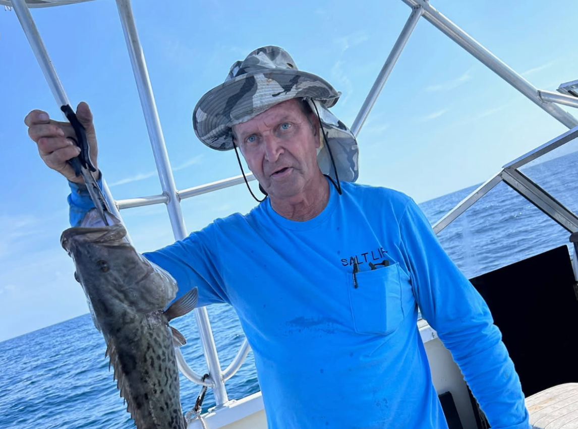 Dennis Woods, 70, was also rescued from the sea by the U.S. Coast Guard