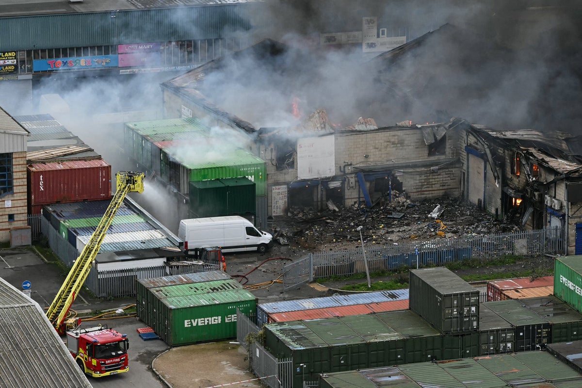 London warehouse still alight after fire tore through building