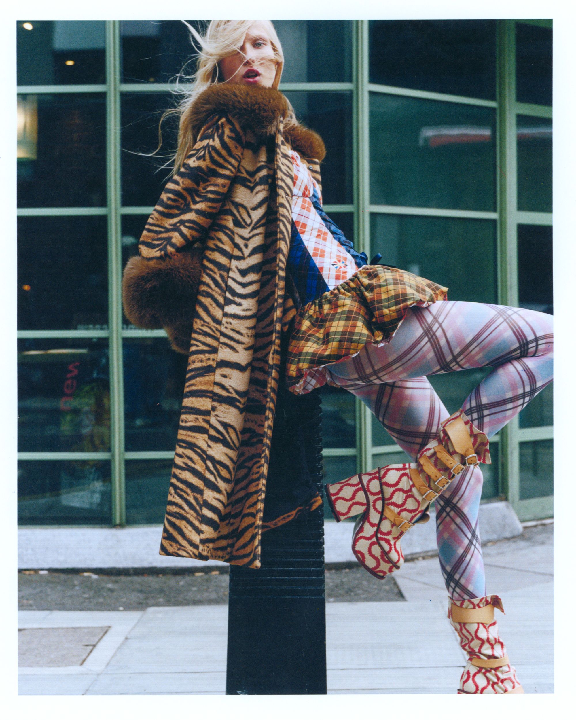 Charlotte Simone’s latest collection features a tiger print coat with faux fur trims that is perfect for party season