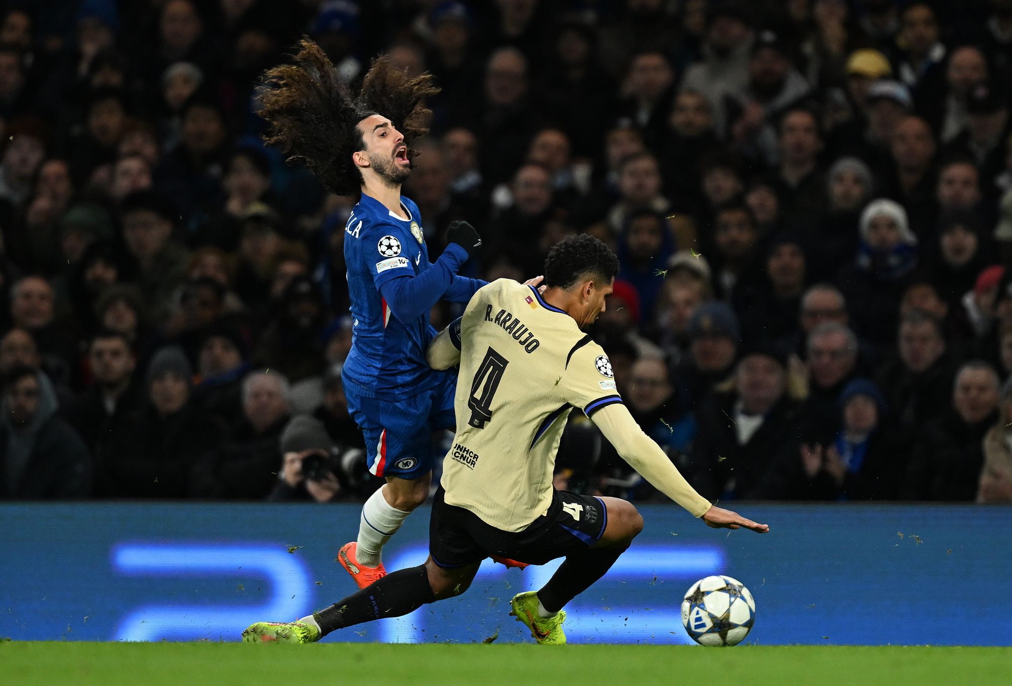 Cucurella is fouled by Ronald Araujo