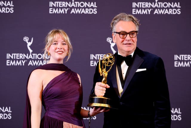 <p>Kenton Allen and Anya Wilson pose with the Best Comedy Award for 'Ludwig'</p>