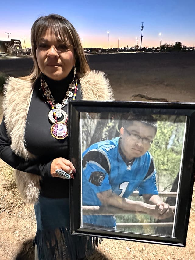 <p>When Vangie Randall-Shorty holds a photo of her son, Zachariah Shorty</p>