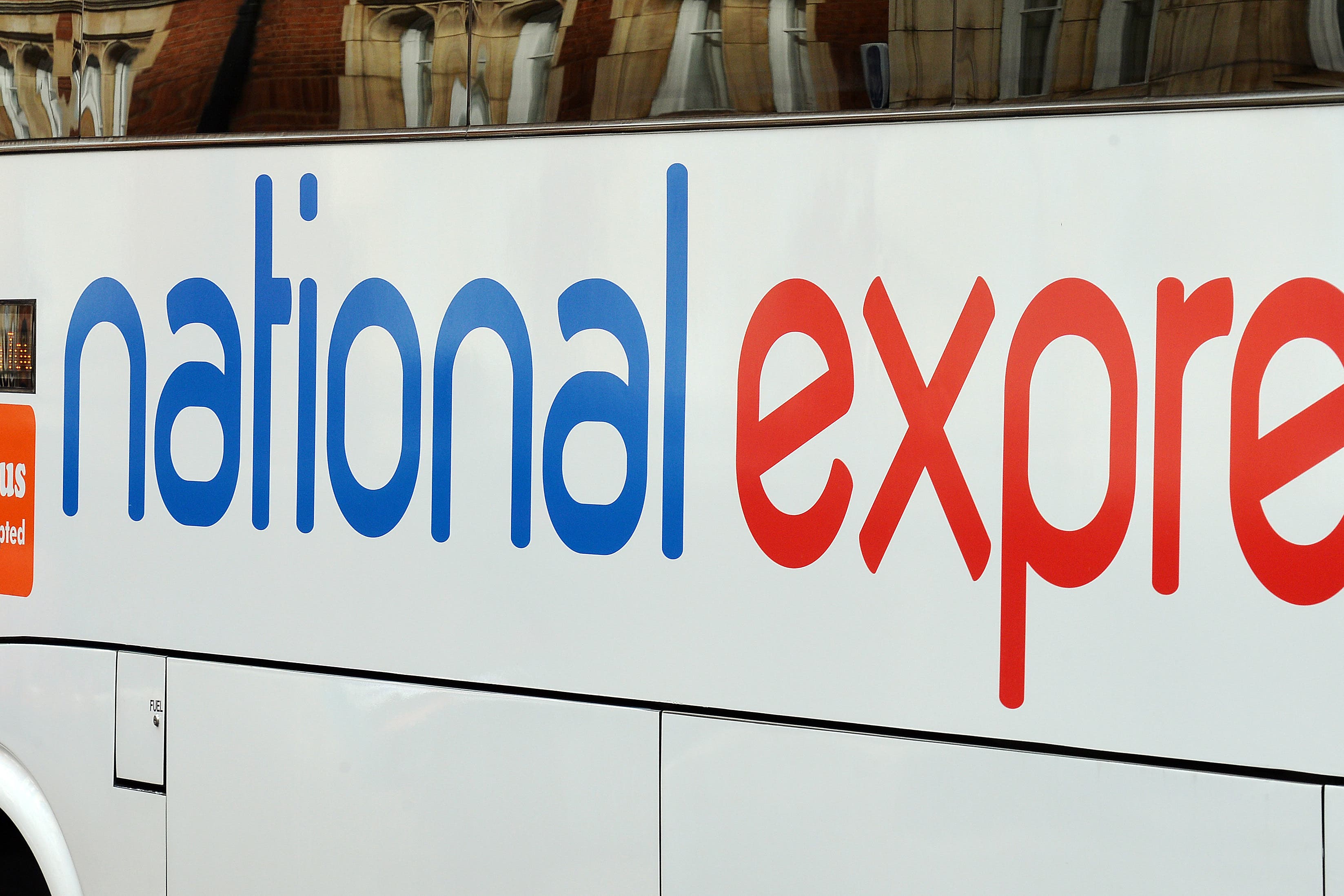 National Express owner Mobico has revealed back office jobs are being cut across the business to slash costs (John Stillwell/PA)