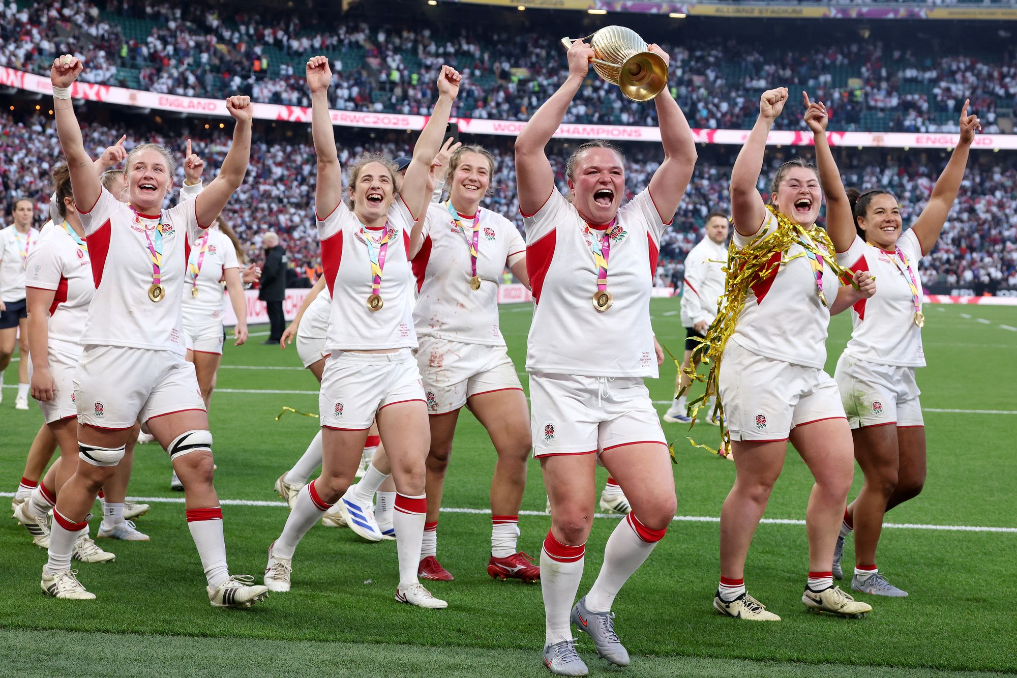 Abby Dow (second from left) celebrates winning the Rugby World Cup in 2025