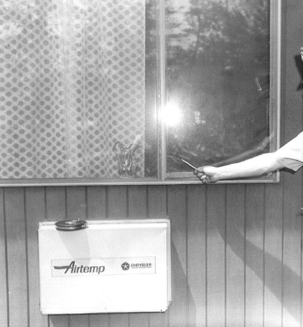 A Concord police officer points to fingerprints on the front window of Judy Lord’s apartment. Fingerprints recovered from the glass were determined to belong to Gable