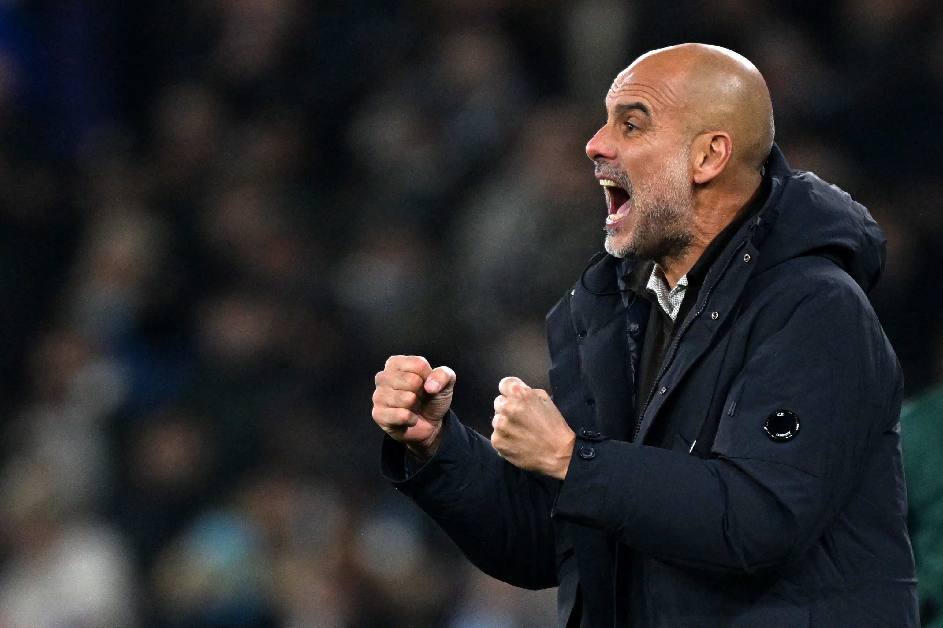 Pep Guardiola cuts a frustrated figure on the touchline as City are beaten by Leverkusen
