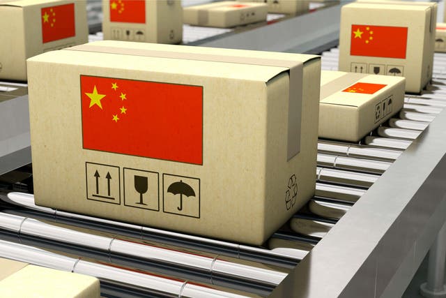 Packages from China on conveyor belt. (Alamy/PA)