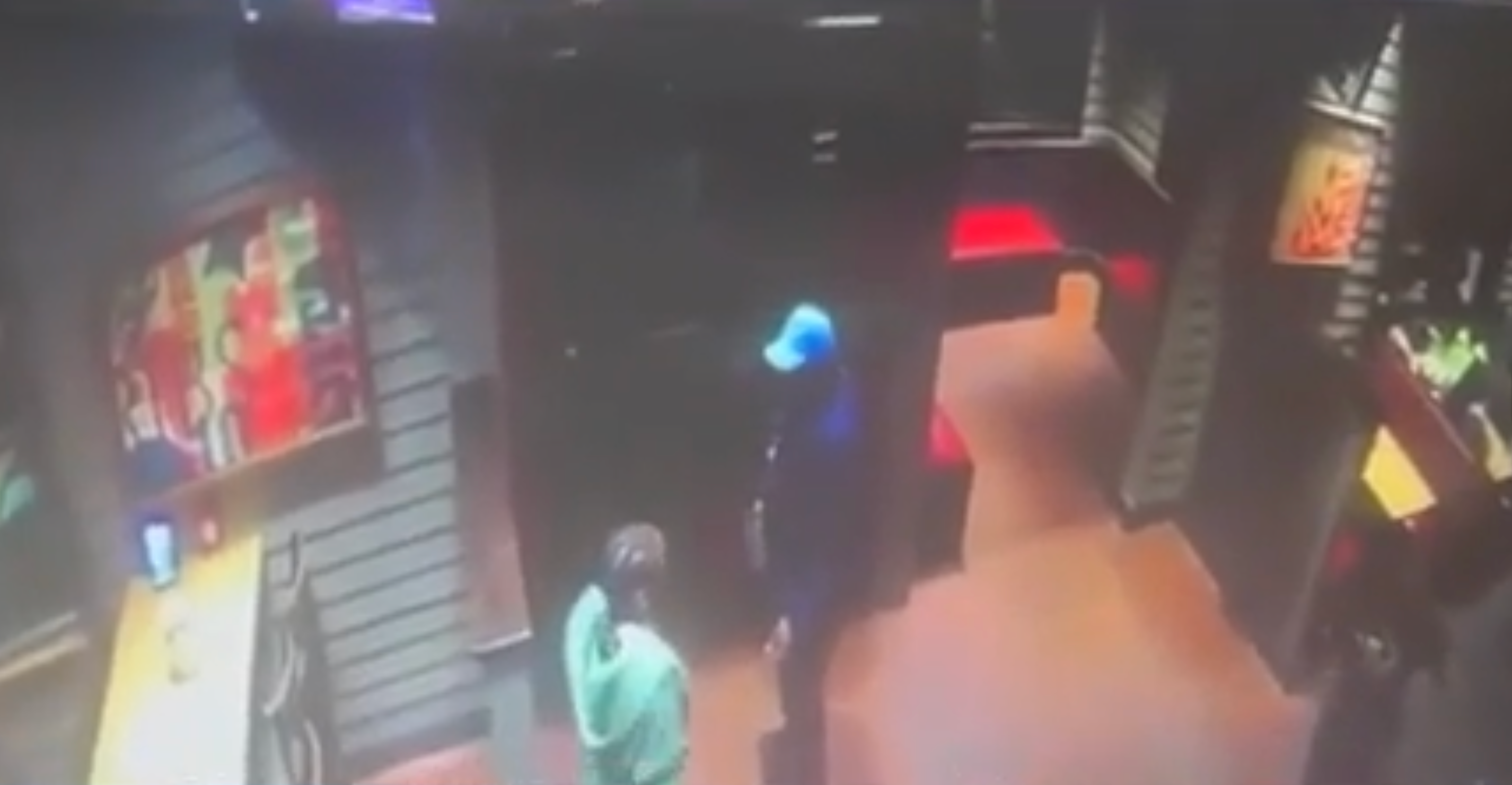 Video shows the group entering the restaurant and talking to Drew, who tells them it would be a 30 minute wait