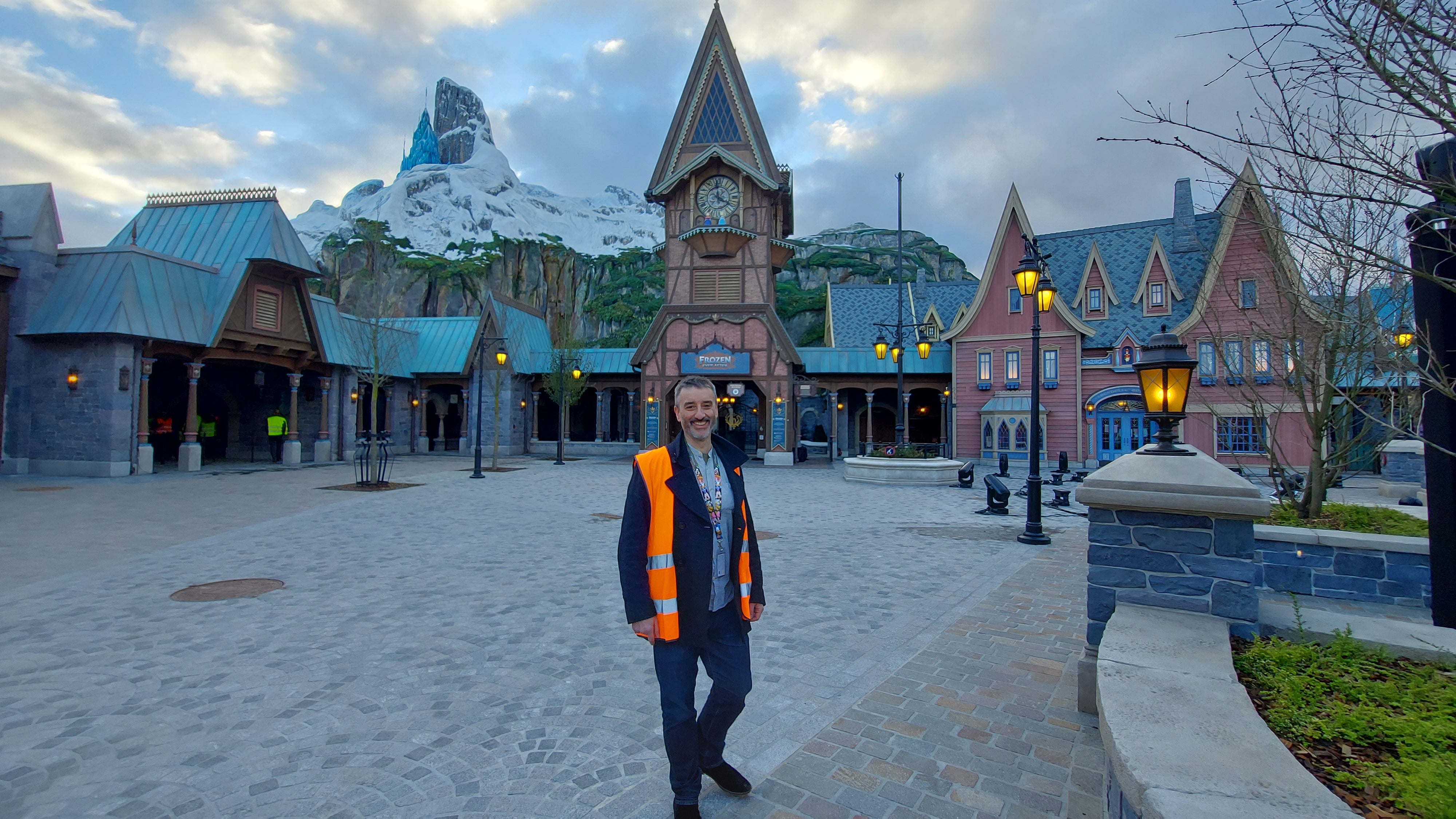 Ted pictured in World of Frozen's Arendelle town square, with the North Mountain in the background