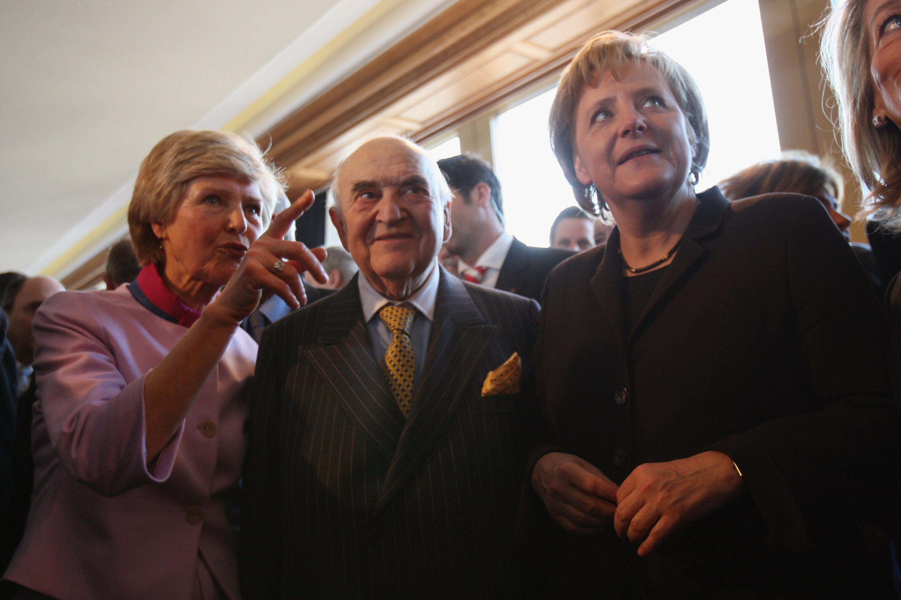 (From L to R) Axel Springer publishing house Deputy Chairwoman Friede Springer, Weidenfeld and German Chancellor Angela Merkel January 14, 2008 in Berlin