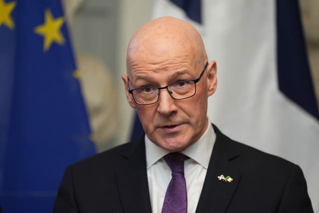 First Minister John Swinney said the Scottish Government would put more money into tackling child poverty (Brian Lawless/PA)
