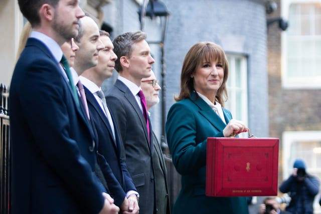 Chancellor Rachel Reeves, right, increased taxes by £26 billion to bolster her fiscal headroom against future economic shocks (Luke Jones/PA)