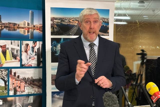 Stormont Finance Minister John O’Dowd speaks to media about Northern Ireland’s Budget allocation at the Department of Finance at Clare House in Belfast on Wednesday evening. (Rebecca Black/PA)