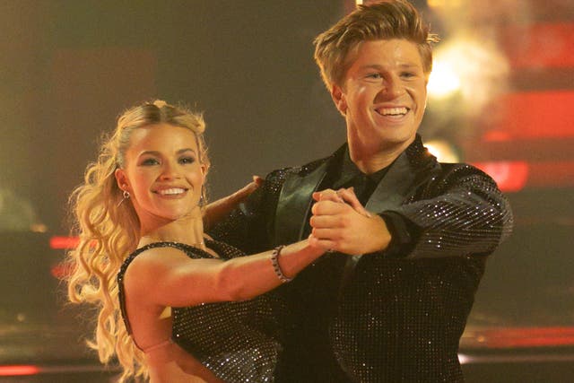 <p>Witney Carson and Robert Irwin have won the Mirrorball Trophy</p>