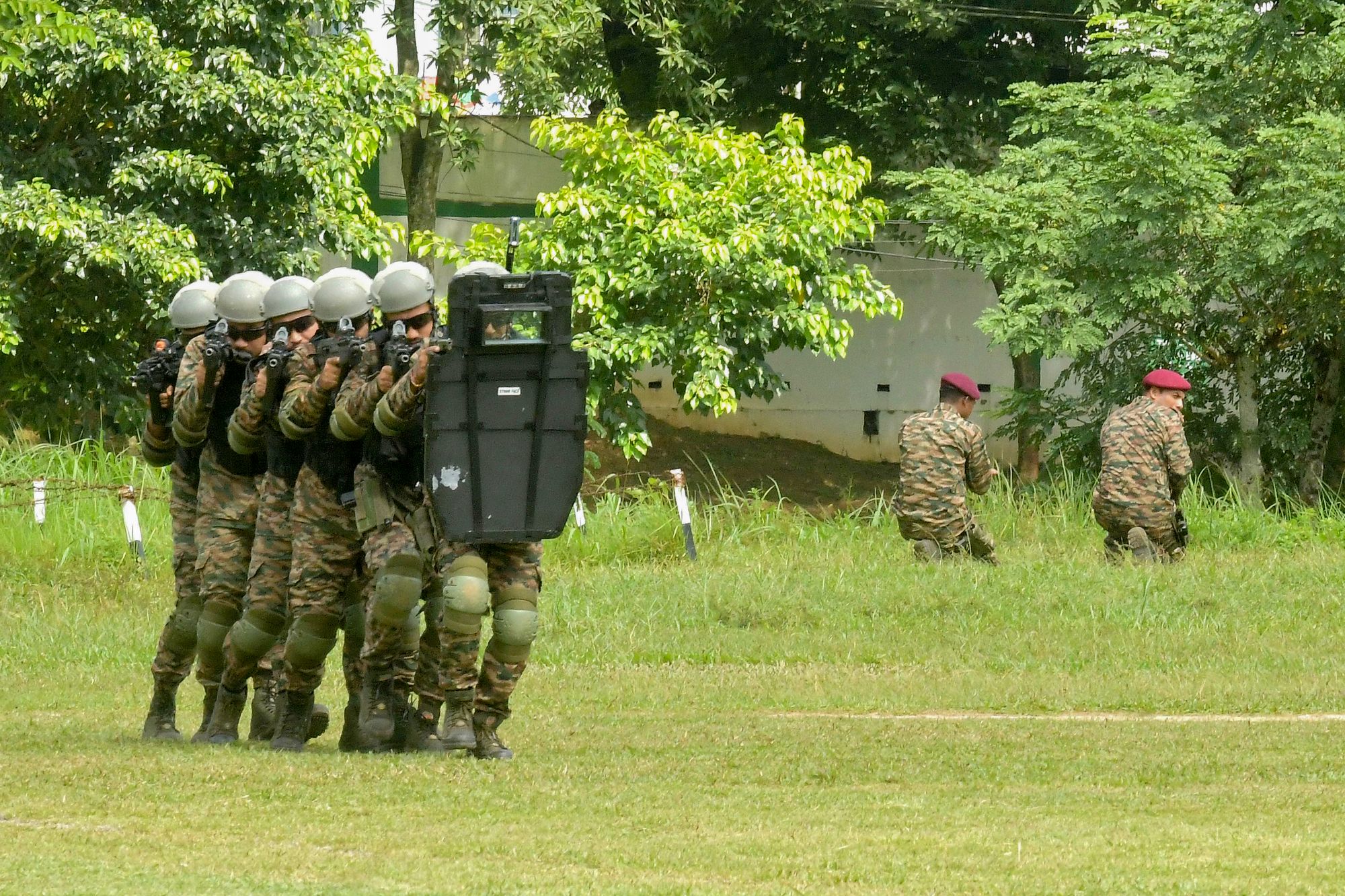 Indian army personnel line up as drones are flown during a military exercise at the Assam Rifles ground in Agartala, Tripura, on 22 August 2025