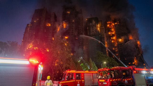 APTOPIX Hong Kong Fire