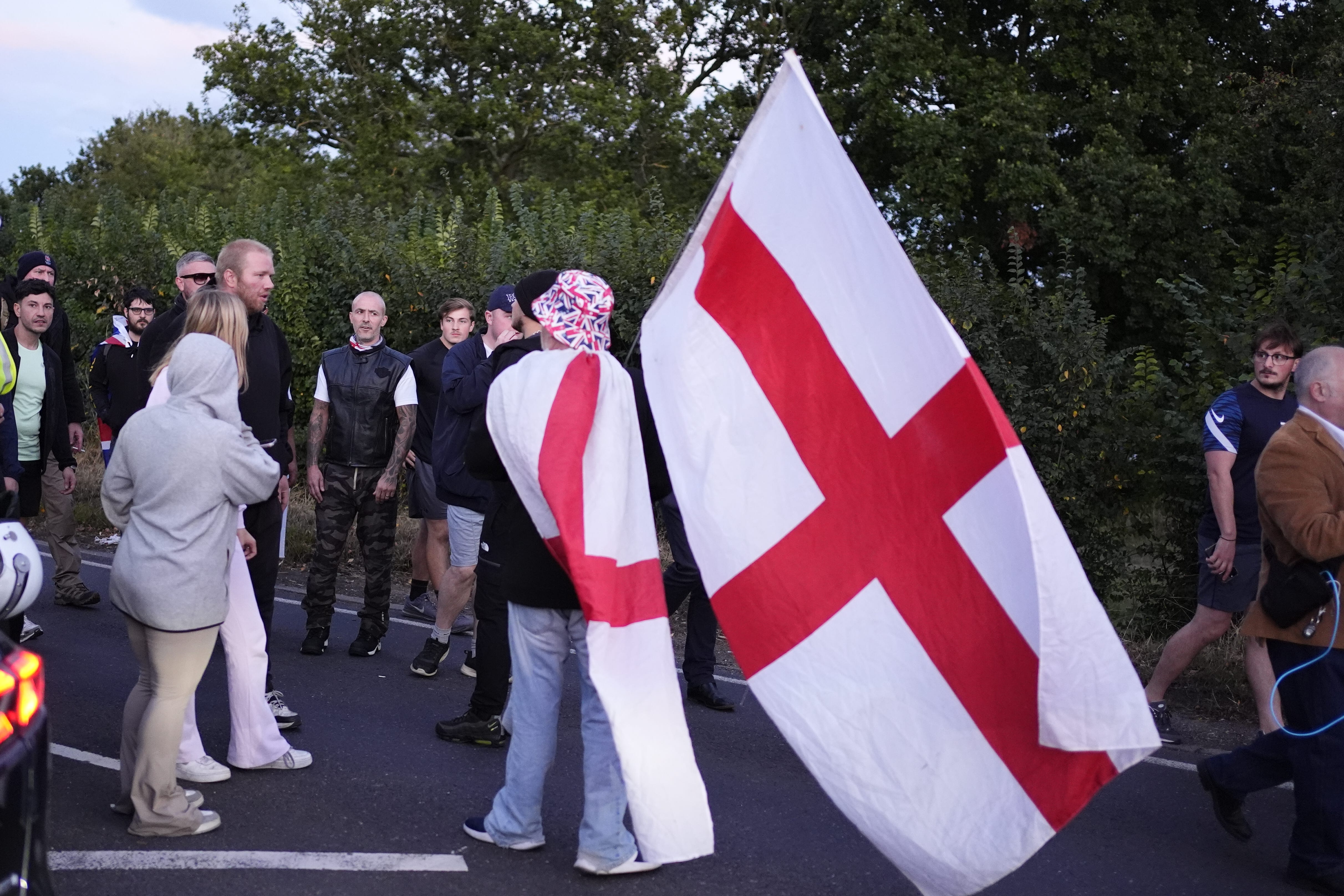 Protests were held outside a hotel housing asylum seekers in Essex this summer (Jordan Pettitt/PA)