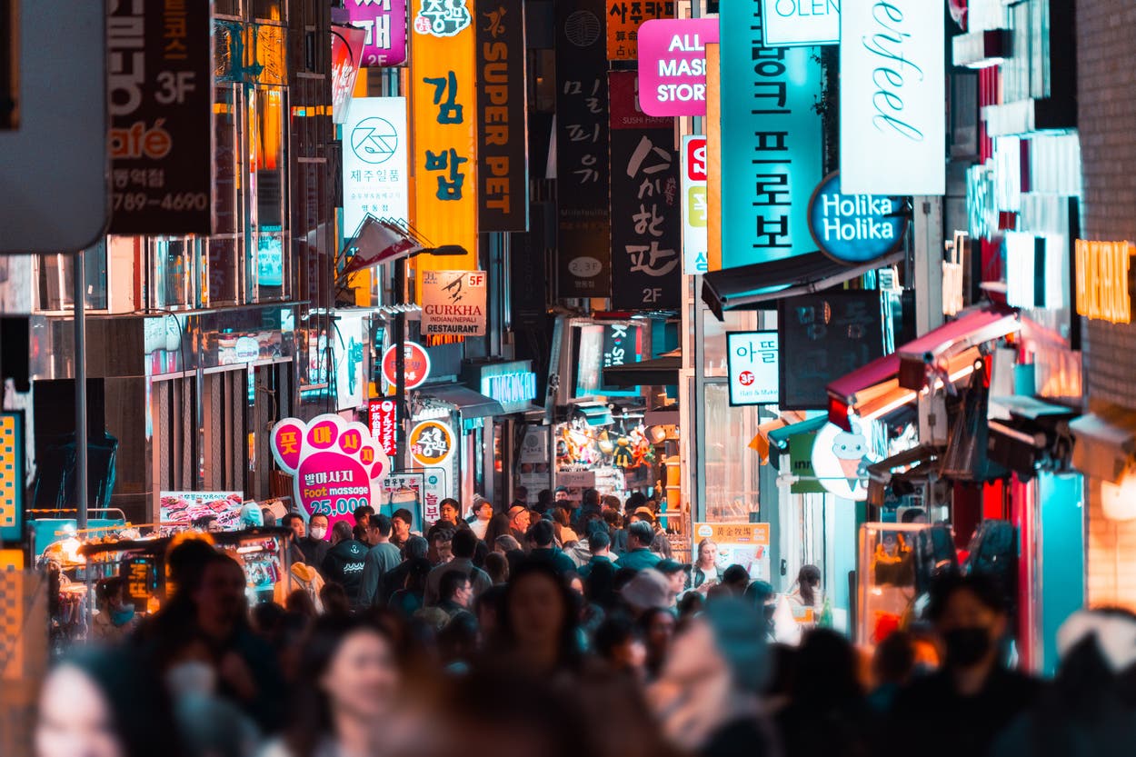 In the fast-paced streets of Seoul, you can feel the dynamism that helped a small country become a cultural giant (Getty Images)
