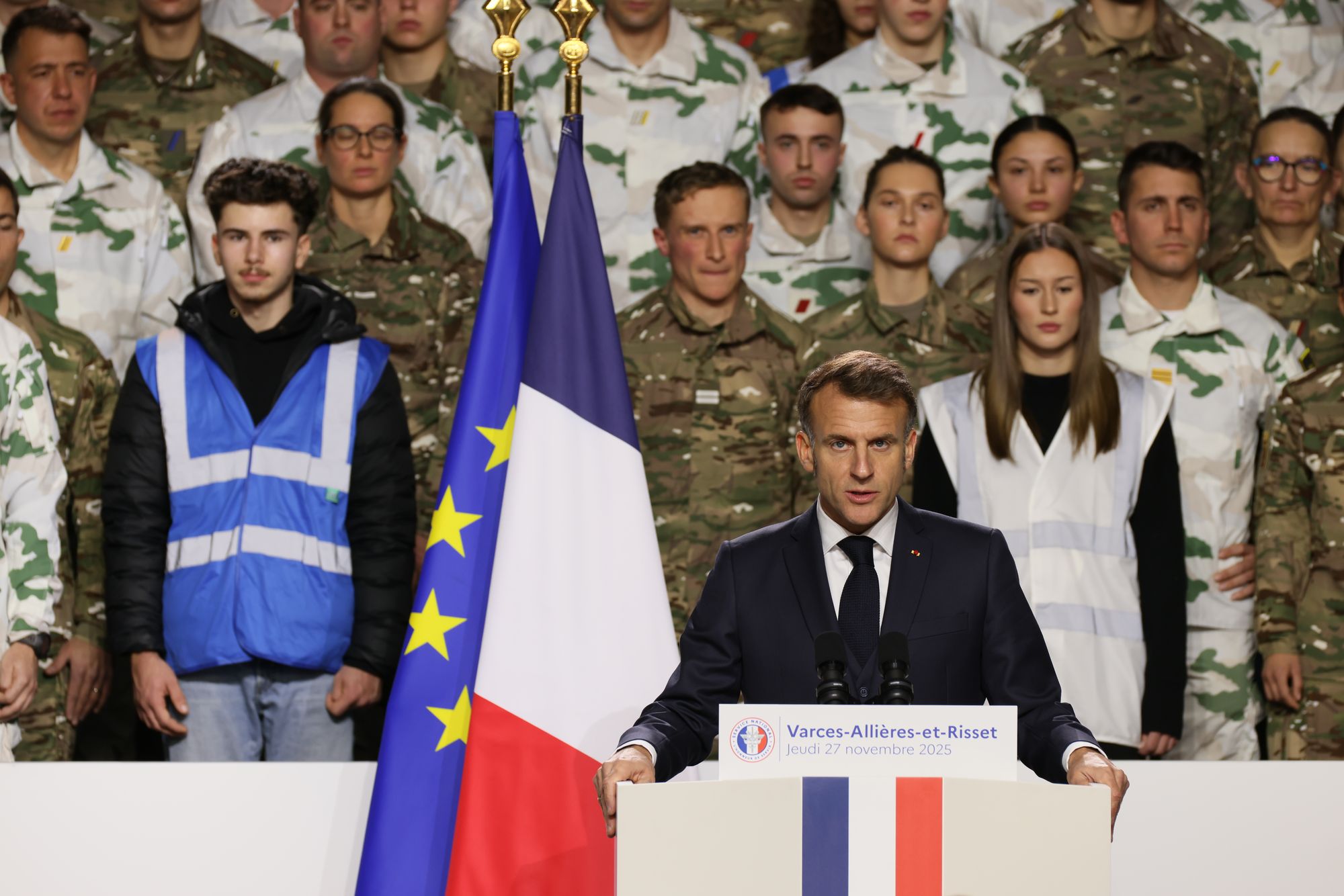 French president Emmanuel Macron delivers his speech to the army to unveil a new national military service at the military base in Varces, French Alps, on 27 November 2025.
