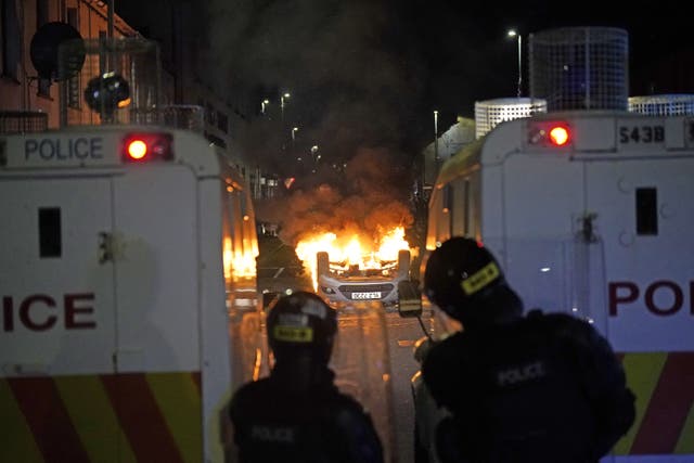 <p>Police respond to violence in Ballymena in June 2025</p>