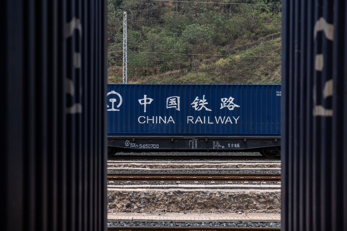 At least 11 dead after train slams into group of railway workers in China