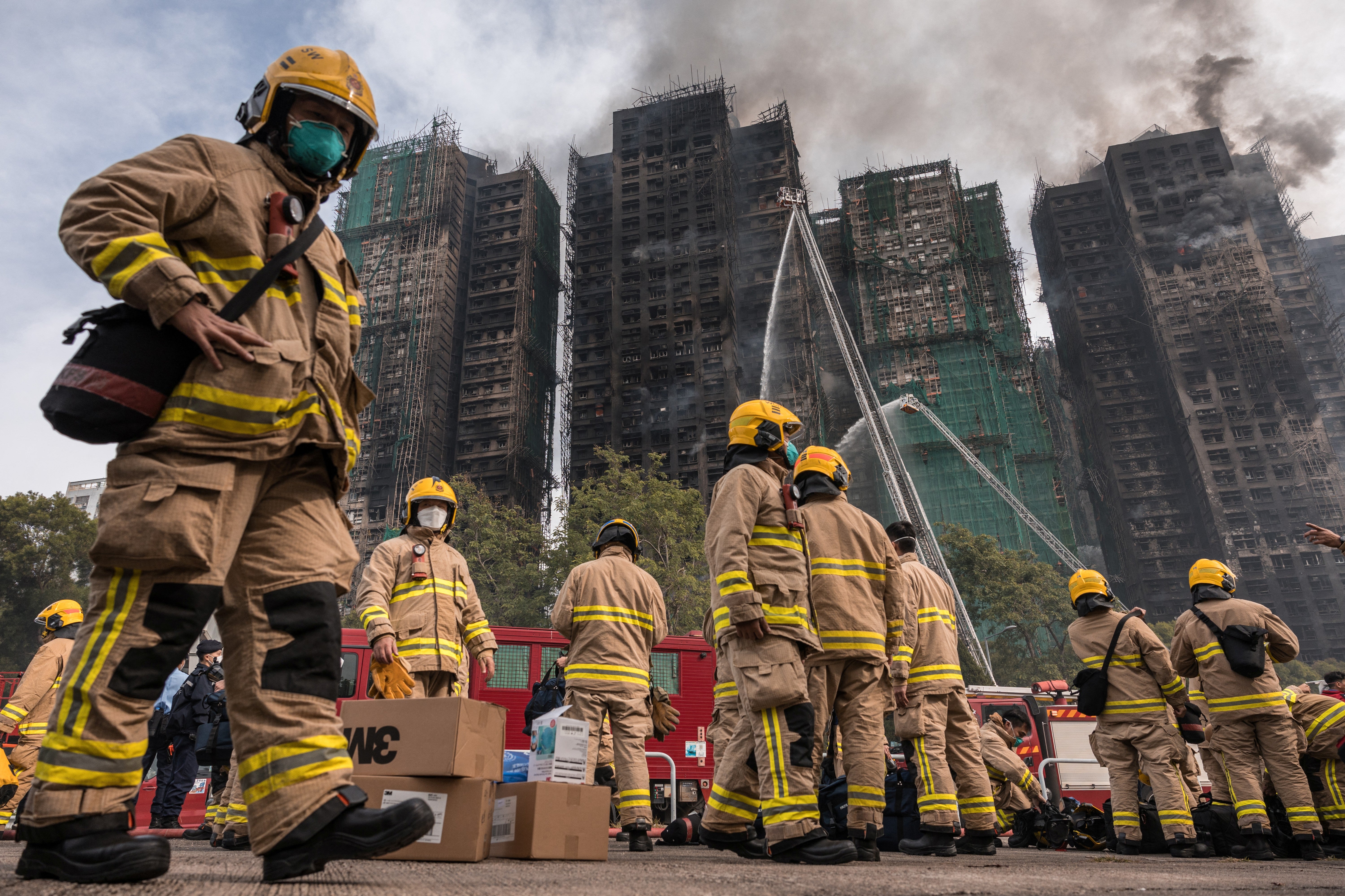 Rescue efforts have been hampered by extreme heat in the smoldering buildings