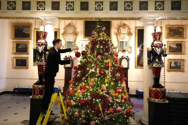 Finishing touches are made to Christmas decorations at Dumfries House (Andrew Milligan/PA)