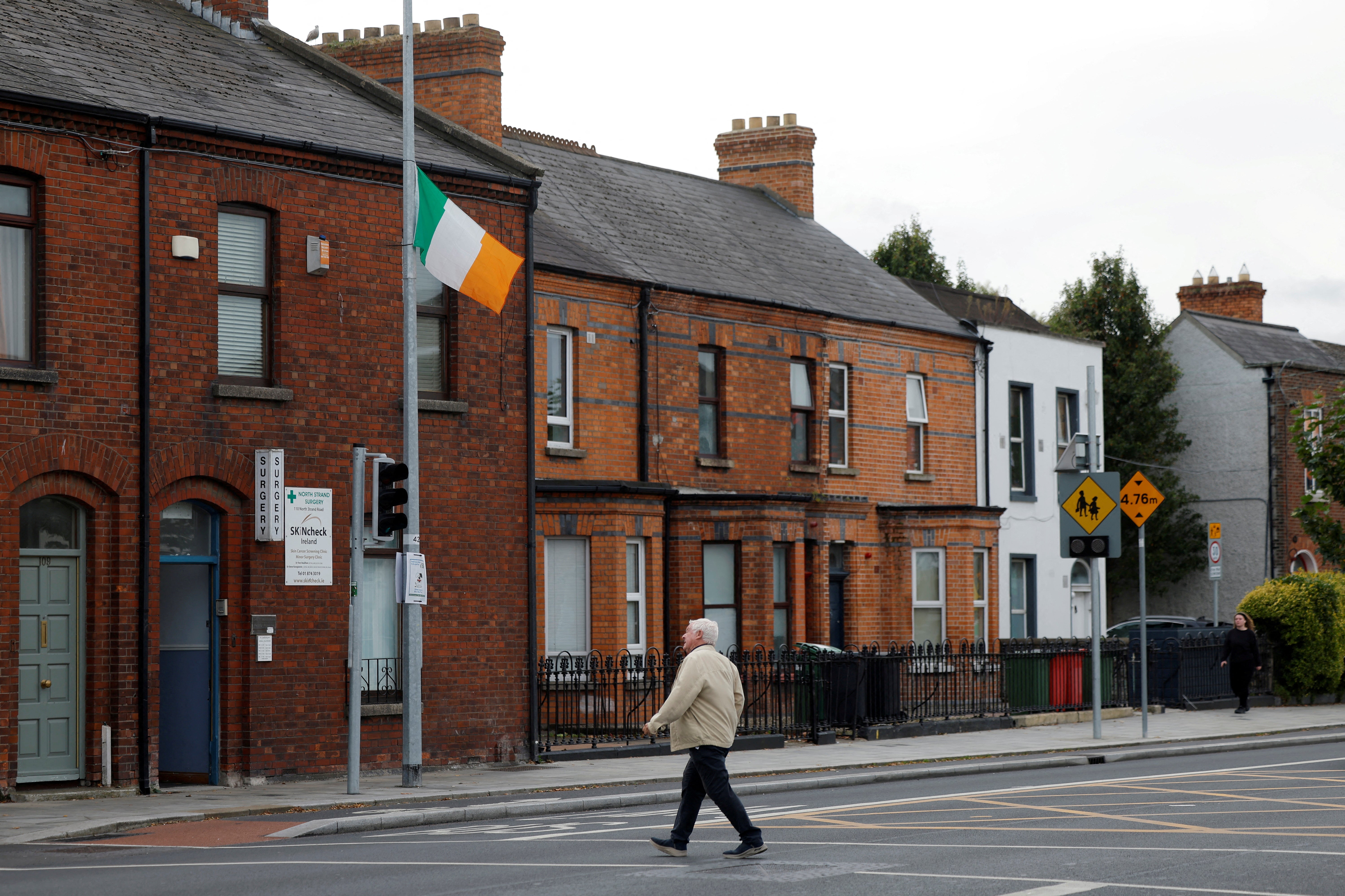 An Irish flag flutters in the North Strand area of Dublin
