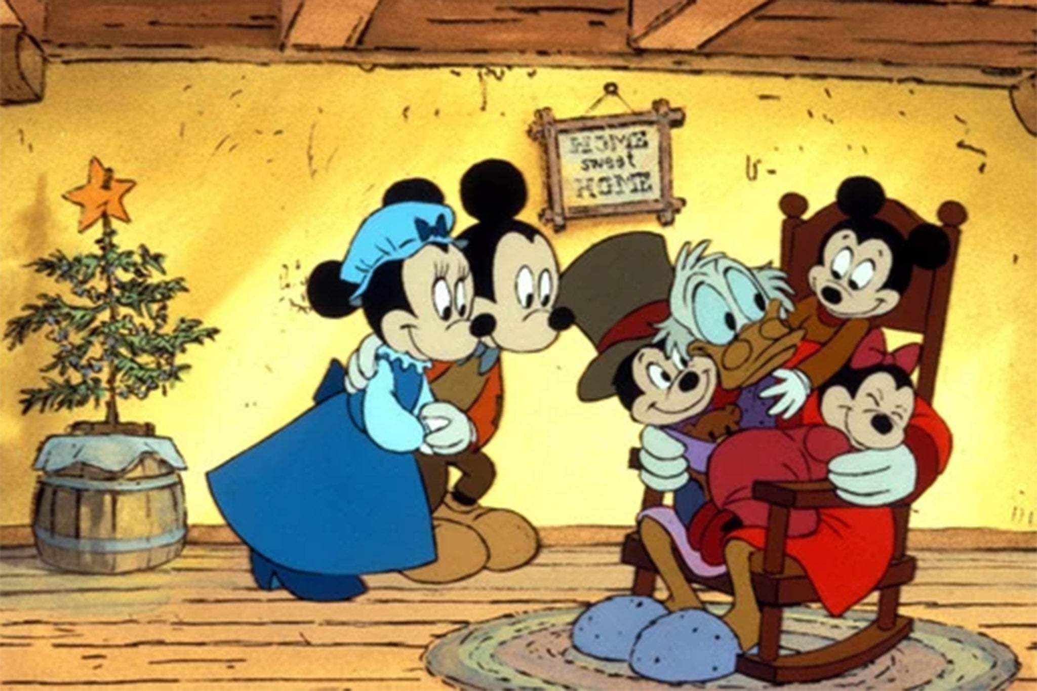 Scrooge McDuck surrounded by the Cratchit family in Disney’s ‘Mickey's Christmas Carol’ (1983)